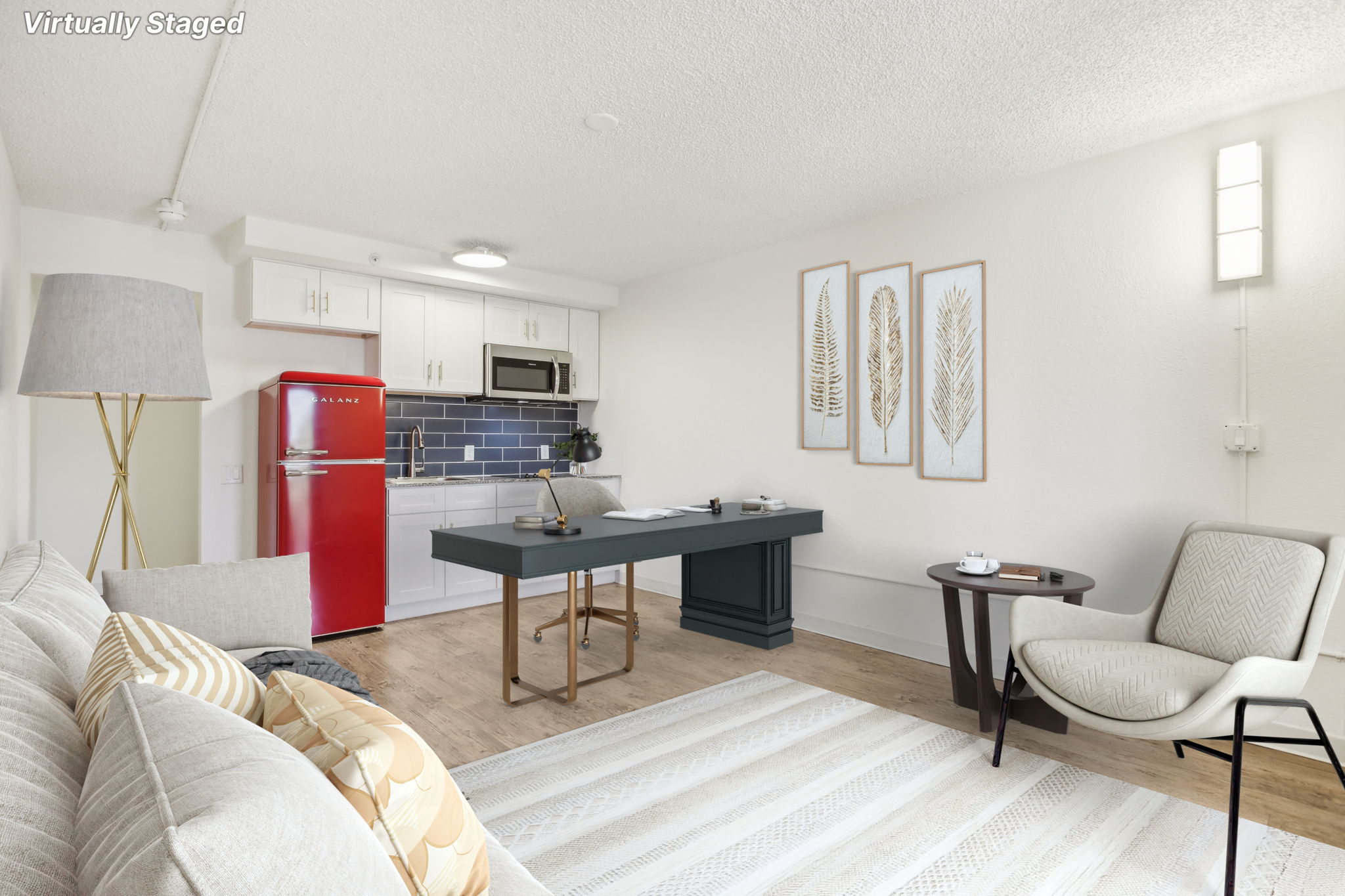 Construction workers discussing blueprints in a comfortable living space provided by CHC Rentals in Austin, TX