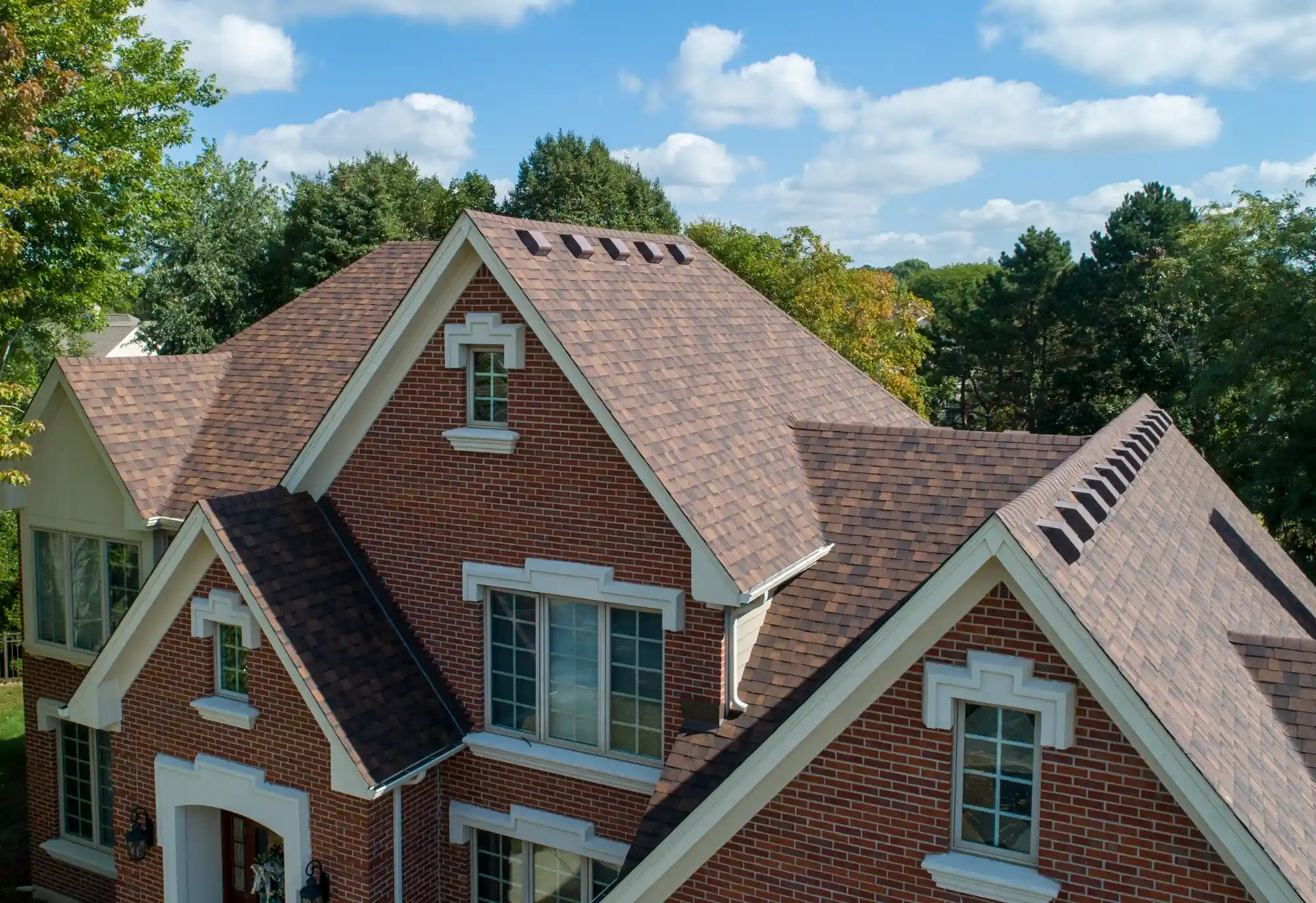 Skilled roofing specialists at work in Texas Township, ensuring a home's top-quality roof installation